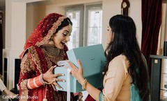Maharani getting a present while getting ready. Maharani getting a present while getting ready.