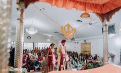 Indian bride and groom walking around the altar ritual. Indian bride and groom walking around the altar ritual.
