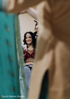 Indian bride drinking coffee while getting ready. Indian bride drinking coffee while getting ready.