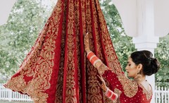 Indian bride getting her wedding ceremony skirt on. Indian bride getting her wedding ceremony skirt on.