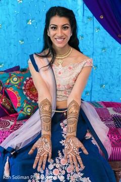 Maharani showing her henna stained arms Maharani showing her henna stained arms