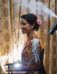 Indian bride getting her wedding ceremony hair style. Indian bride getting her wedding ceremony hair style.