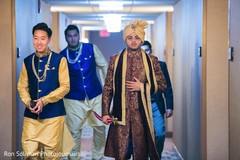 Indian groom walking with groomsmen to ceremony. Indian groom walking with groomsmen to ceremony.