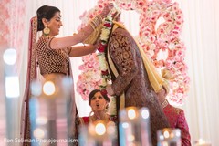 Maharani putting garland to groom ritual. Maharani putting garland to groom ritual.