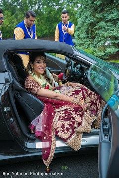 Indian bride getting on her wedding vehicle. Indian bride getting on her wedding vehicle.