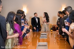 Indian bridesmaids and groomsmen having cheers with couple. Indian bridesmaids and groomsmen having cheers with couple.