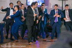 Indian groomsmen making their entrance to reception. Indian groomsmen making their entrance to reception.