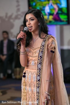 Indian bridesmaid giving out her reception speech. Indian bridesmaid giving out her reception speech.