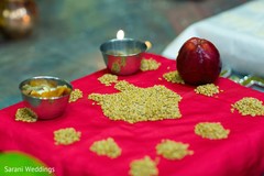 Indian wedding ceremony rice, apple, seeds and pots for ritual. Indian wedding ceremony rice, apple, seeds and pots for ritual.