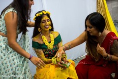 Indian bride being cover up with turmeric paste. Indian bride being cover up with turmeric paste.