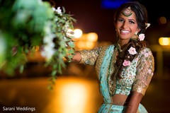 Indian bride on her sky blue and golden lehenga. Indian bride on her sky blue and golden lehenga.
