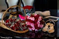 Indian bridal pink and red wedding bouquet and shoes. Indian bridal pink and red wedding bouquet and shoes.