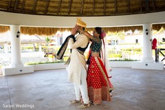 Indian bride surprising the groom. Indian bride surprising the groom.