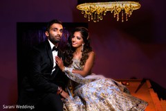 Indian bride and groom posing at pool table. Indian bride and groom posing at pool table.