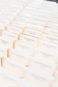 Indian wedding white with golden strip place cards. Indian wedding white with golden strip place cards.
