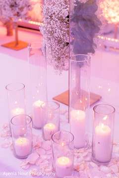 White candles on cristal tubes for Indian stage decoration. White candles on cristal tubes for Indian stage decoration.
