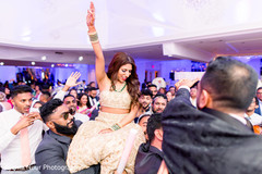 Maharani lifted by groomsmen at reception. Maharani lifted by groomsmen at reception.