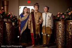 Raja walking on the ceremony aisle. Raja walking on the ceremony aisle.