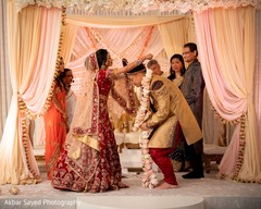 Indian couple during the garland ceremony ritual. Indian couple during the garland ceremony ritual.