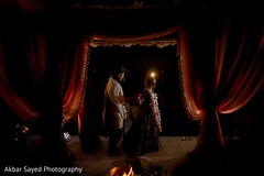 Indian couple posing at mandap photo session. Indian couple posing at mandap photo session.