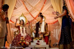 Indian Bride and groom at traditional wedding game. Indian Bride and groom at traditional wedding game.