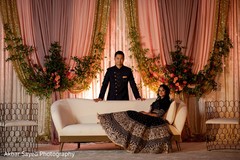 Peach and golden indian wedding reception stage decoration. Peach and golden indian wedding reception stage decoration.