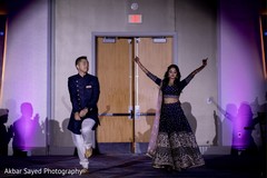 Indian bride and groom making their entrance to reception. Indian bride and groom making their entrance to reception.
