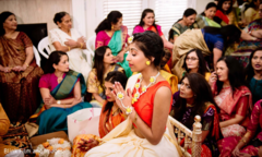 Maharani saying a prayer at the start of the Gaye Holud Maharani saying a prayer at the start of the Gaye Holud