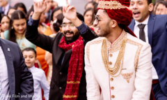 Indian relatives dancing behind the Indian groom during Baraat Indian relatives dancing behind the Indian groom during Baraat