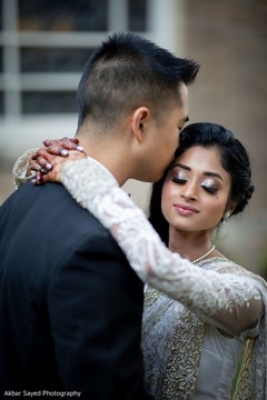 Indian groom kissing bride photography. Indian groom kissing bride photography.
