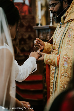 Raja getting his ring blessed at ceremony. Raja getting his ring blessed at ceremony.