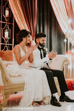 Indian bride and groom at their wedding reception stage. Indian bride and groom at their wedding reception stage.