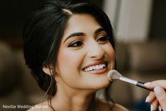 Indian bride getting her makeup done. Indian bride getting her makeup done.