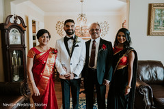 Indian groom posing with family capture. Indian groom posing with family capture.