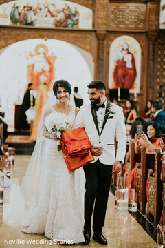 Indian couple walking down the aisle capture. Indian couple walking down the aisle capture.