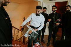 Indian groom receiving a present capture. Indian groom receiving a present capture.
