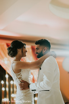 Indian bride and groom romantic first dance capture. Indian bride and groom romantic first dance capture.