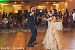 Indian newlyweds enjoying themselves on the dance-floor Indian newlyweds enjoying themselves on the dance-floor