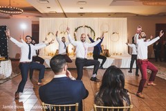 Indian groomsmen performing a choreography Indian groomsmen performing a choreography