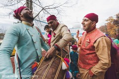 Indian drummer and Indian relatives during the Baraat Indian drummer and Indian relatives during the Baraat