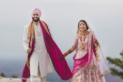 Indian couple holding hands and running Indian couple holding hands and running