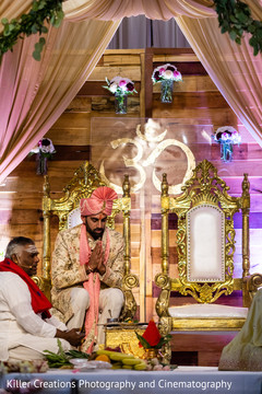 Indian groom praying in the wedding altar. Indian groom praying in the wedding altar.