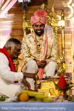 Indian groom with the wedding priest. Indian groom with the wedding priest.