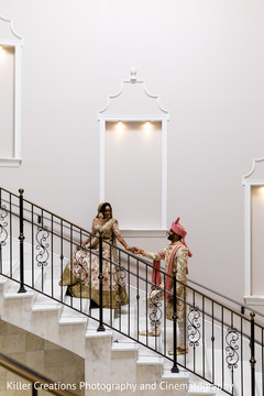Maharani guiding her Indian groom through the stairs. Maharani guiding her Indian groom through the stairs.