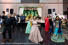 Indian relatives performing during the sangeet. Indian relatives performing during the sangeet.