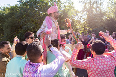 Indian groom being lifted by groomsmen during Baraat. Indian groom being lifted by groomsmen during Baraat.
