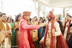 Indian groom dancing with relatives during baraat. Indian groom dancing with relatives during baraat.