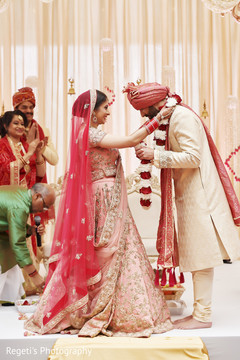 Maharani putting garland on her Indian groom. Maharani putting garland on her Indian groom.