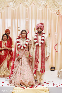 Maharani and Raja standing on the wedding altar. Maharani and Raja standing on the wedding altar.