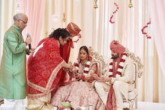 Indian couple receiving parents blessing. Indian couple receiving parents blessing.